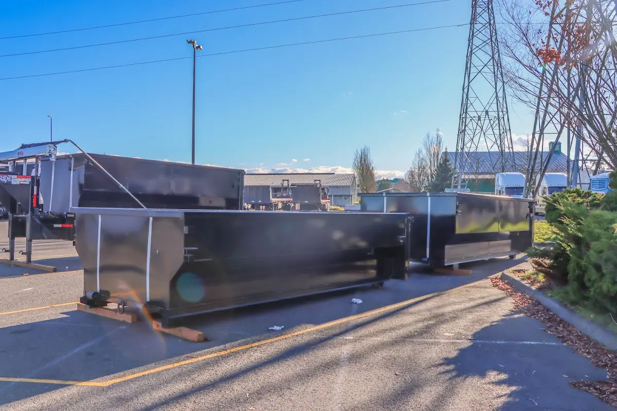 Roll-off dumpster ready for waste disposal at job site for 4 Yard Dumpster Rental in Ashland